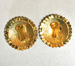 Vintage Gianni Versace large round gold tone medusa face earrings with crystal glasses. Must have Lady Gaga style jewelry piece.