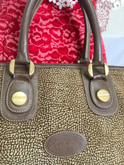Vintage Borbonese by red wall, brown and beige leather classic bag with golden logo charm.  Unisex use. Masterpiece.