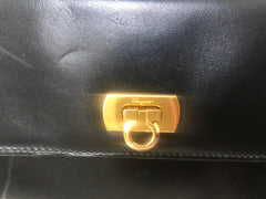 Vintage Salvatore Ferragamo Gancini black leather wallet with gold tone closure. Classic purse. 070203re1