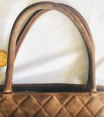 Vintage CHANEL brown suede classic tote bag with large CC mark and golden CC medal charm to the zipper. Classic purse for daily use.