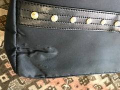 Vintage Gianni Versace large black nylon and leather combination tote bag with gold tone sunburst motifs and chains. 050425r4