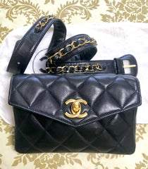 1980s. Vintage CHANEL black lamb leather belt bag, waist bag, fanny pack with golden chain belt & CC closure.  Belt size good for 23.8" through 26.2" (60.5-66.5cm)
