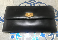 Vintage Salvatore Ferragamo Gancini black leather wallet with gold tone closure. Classic purse. 070203re1