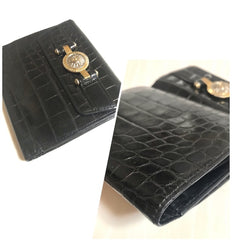 Vintage Gianni Versace black croc embossed leather wallet. Golden and silver Sunburst charm at front. Masterpiece for unisex use. 050407r8