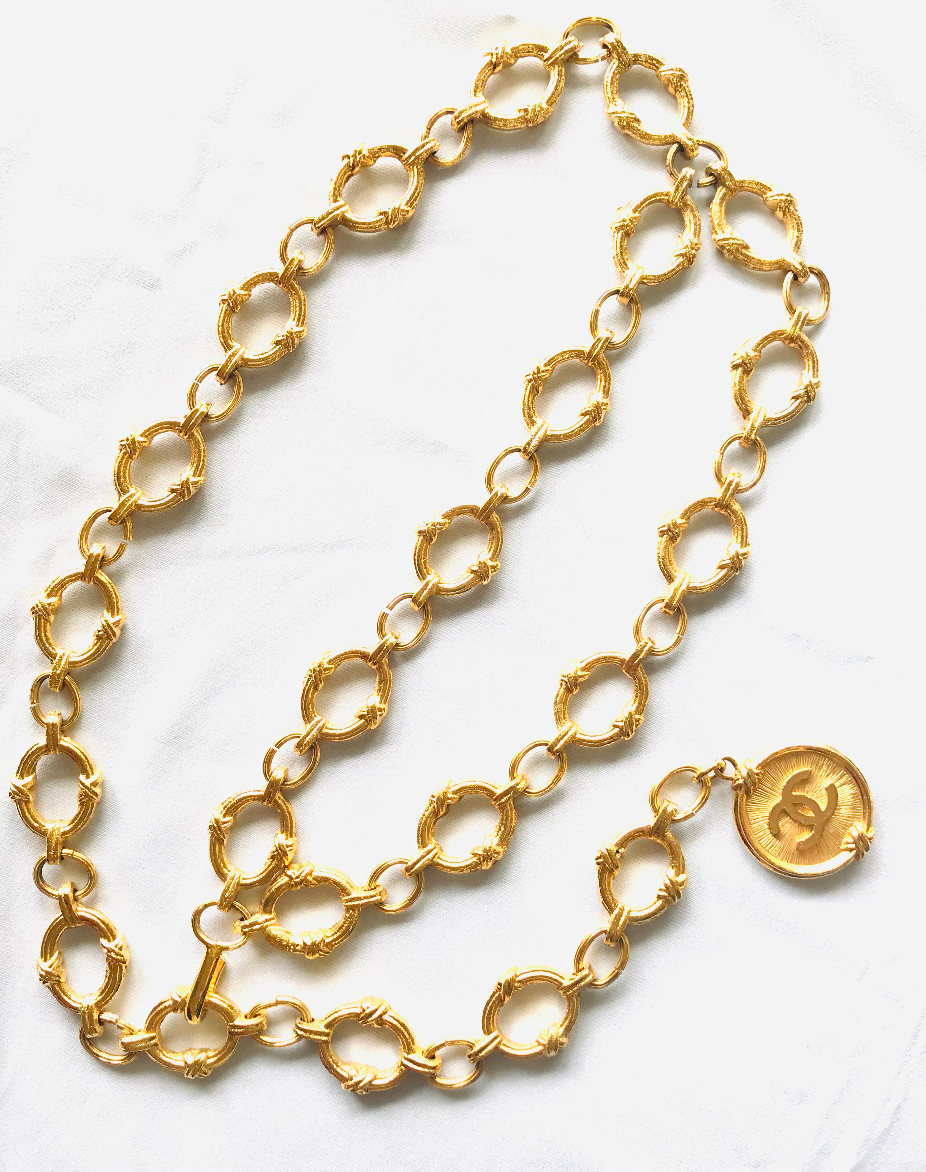 Vintage CHANEL nice and heavy thick golden chain belt with large CC motif charm. Double chain design at front. Gorgeous belt. 07610re4