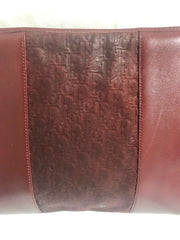 Vintage Christian Dior wine red leather clutch shoulder bag with engraved logo at center. Classic and beautiful purse. 060905r4