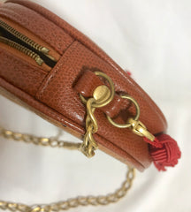 Vintage MCM brown monogram mini Suzy Wong chain shoulder purse with red fringes. Designed by Michael Cromer. Rare purse.