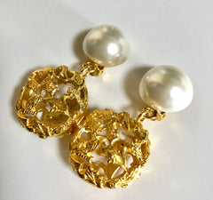 Vintage Salvatore Ferragamo white faux pearl dangle earrings with golden shoe design featured charm. Gorgesous jewelry.