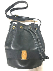Vintage Salvatore Ferragamo black leather hobo style shoulder bag with vara logo motif and drawstrings. Classic bag for daily use. 050317r1