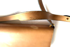 Vintage Christian Dior tanned brown leather shoulder clutch bag with golden CD motif.