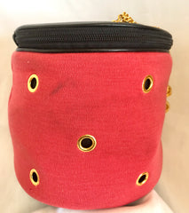 Vintage Moschino by Redwall lunchbox design red jersey and black leather handbag with golden eyelets and ball charms. 0506289