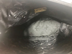 Vintage Paloma Picasso black leather bolide bag style handbag with iconic golden logo motif. Classic shape bag.