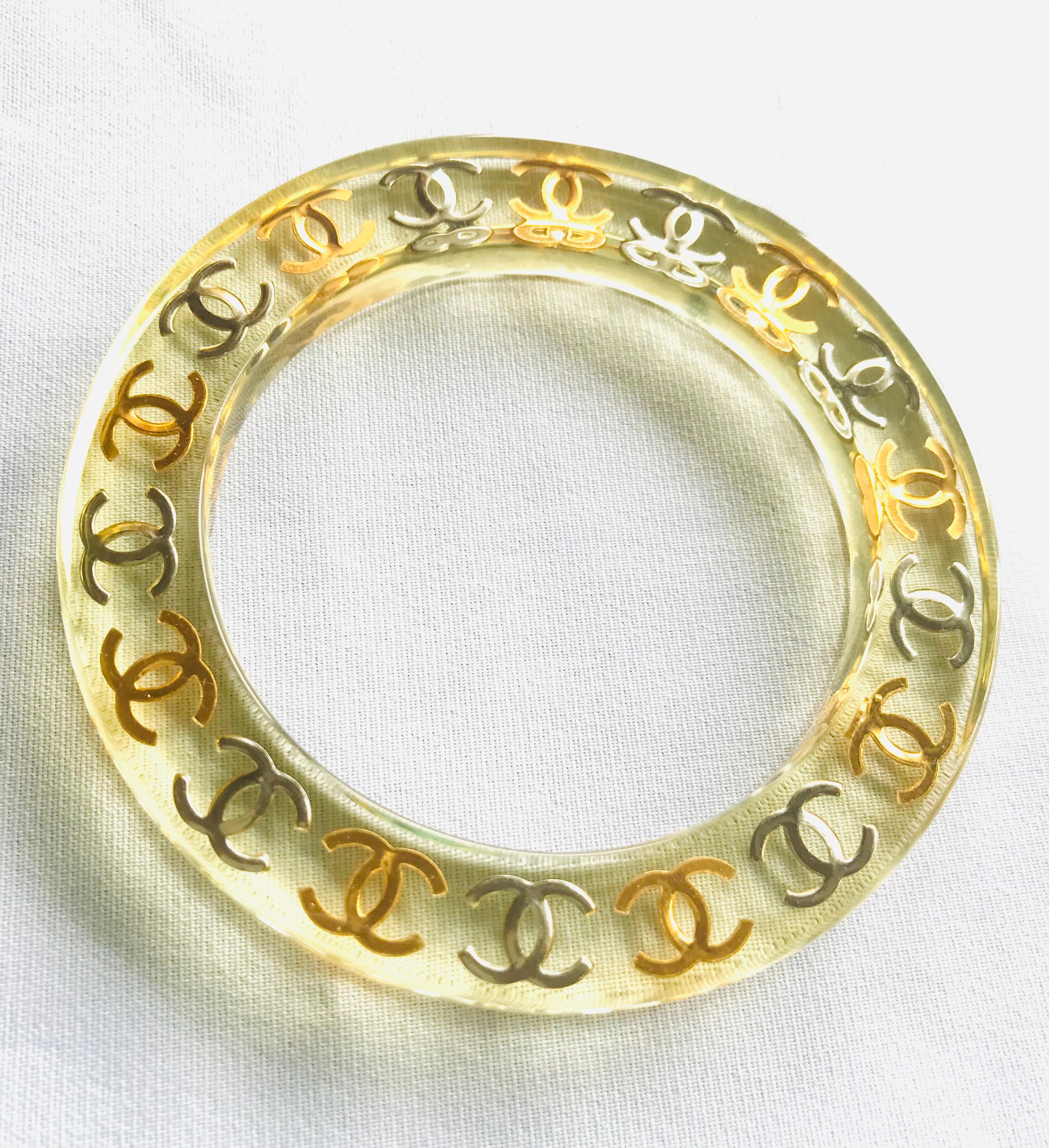 Vintage CHANEL resin bangle, bracelet with gold and silver CC marks. One of a kind jewelry piece. 050323re7