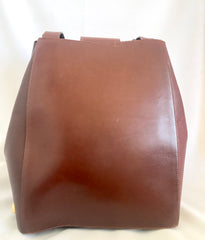 Vintage Salvatore Ferragamo brown leather purse with gold tone elegant closure. Featuring Ferragamo charms. 060516re4