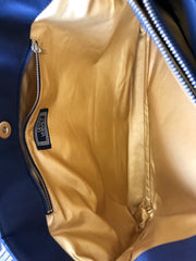 Vintage Gianni Versace large black nylon and leather combination tote bag with gold tone sunburst motifs and chains. 050425r4