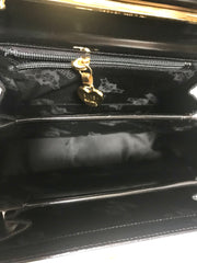 Vintage MOSCHINO black patent enamel Kelly style handbag with M logo and heart motifs. Masterpiece by Redwall. 050323re4