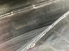 1980s. Vintage CHANEL black goatskin bill, card, checkbook long wallet pouch purse with  mini CC motif.  Classic unisex style.