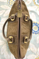 Vintage Borbonese by red wall, brown and beige leather classic bag with golden logo charm.  Unisex use. Masterpiece.