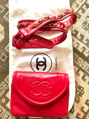 Vintage CHANEL red leather belt bag, fanny pack with detachable chain belt and CC stitch mark on flap.  Fits 29.5" through 32.8"