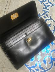 Vintage Salvatore Ferragamo Gancini black leather wallet with gold tone closure. Classic purse. 070203re1