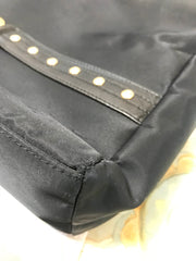 Vintage Gianni Versace large black nylon and leather combination tote bag with gold tone sunburst motifs and chains. 050425r4