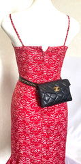 1980s. Vintage CHANEL black lamb leather belt bag, waist bag, fanny pack with golden chain belt & CC closure.  Belt size good for 23.8" through 26.2" (60.5-66.5cm)