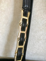 Vintage Gianni Versace large black nylon and leather combination tote bag with gold tone sunburst motifs and chains. 050425r4