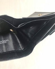 Vintage Gianni Versace black croc embossed leather wallet. Golden and silver Sunburst charm at front. Masterpiece for unisex use. 050407r8