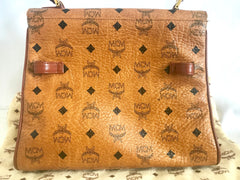 Vintage MCM classic brown monogram Kelly bag with golden logo plate. Perfect daily use bag.  By Michael Cromber, Germany