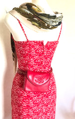 Vintage CHANEL red leather belt bag, fanny pack with detachable chain belt and CC stitch mark on flap.  Fits 29.5" through 32.8"