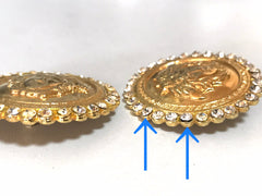 Vintage Gianni Versace large round gold tone medusa face earrings with crystal glasses. Must have Lady Gaga style jewelry piece.