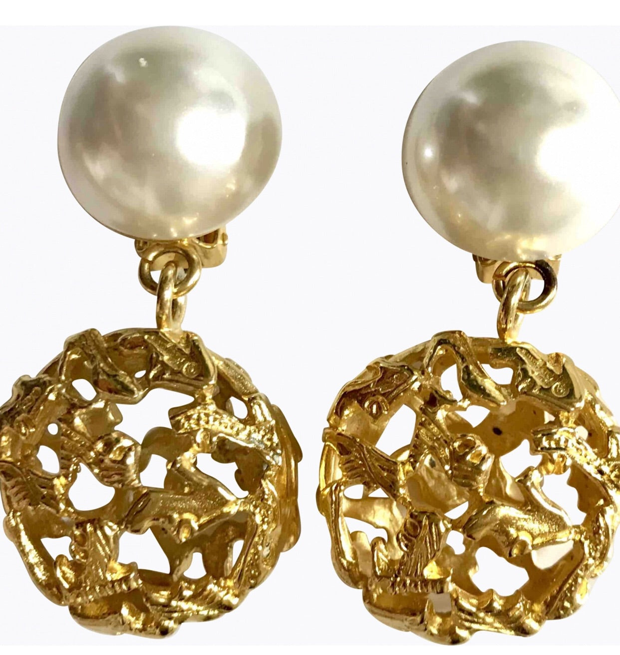 Vintage Salvatore Ferragamo white faux pearl dangle earrings with golden shoe design featured charm. Gorgesous jewelry.