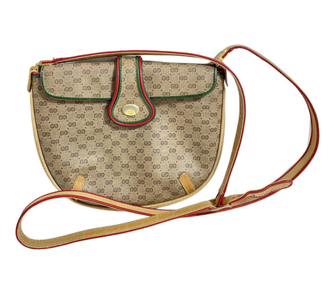 Vintage Gucci GG monogram shoulder bag with red and green webbing color convo shoulder bag. Golden and silver GG motif on the flap. 0411273