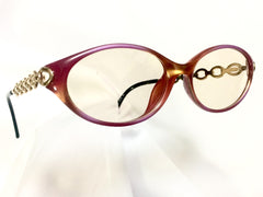 60's, 70's vintage Christian Dior pink and orange gradation sunglasses with golden chain temple. Unique and mod eyewear.