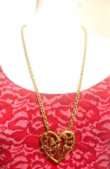 Vintage Moschino golden chain necklace with large arabesque heart design pendant top. Moschino BIJOUX jewelry.