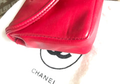 Vintage CHANEL red leather belt bag, fanny pack with detachable chain belt and CC stitch mark on flap.  Fits 29.5" through 32.8"
