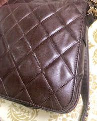 80's vintage Chanel dark brown quilted lambskin shoulder bag with CC motif and built-in chain shoulder strap. Rare Chanel purse