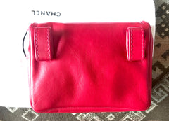 Vintage CHANEL red leather belt bag, fanny pack with detachable chain belt and CC stitch mark on flap.  Fits 29.5" through 32.8"
