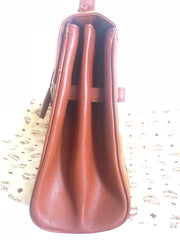 Vintage MCM classic brown monogram Kelly bag with golden logo plate. Perfect daily use bag.  By Michael Cromber, Germany