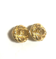 Vintage CHANEL gold tone round earrings with CC mark. Classic vintage Chanel jewelry.
