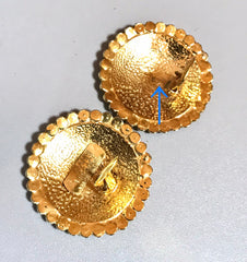 Vintage Gianni Versace large round gold tone medusa face earrings with crystal glasses. Must have Lady Gaga style jewelry piece.