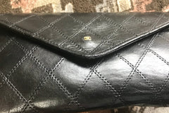 1980s. Vintage CHANEL black goatskin bill, card, checkbook long wallet pouch purse with  mini CC motif.  Classic unisex style.