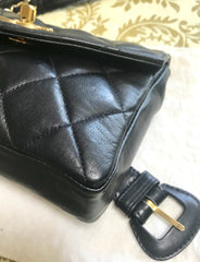 1980s. Vintage CHANEL black lamb leather belt bag, waist bag, fanny pack with golden chain belt & CC closure.  Belt size good for 23.8" through 26.2" (60.5-66.5cm)