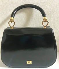 Vintage MOSCHINO black patent enamel Kelly style handbag with M logo and heart motifs. Masterpiece by Redwall. 050323re4