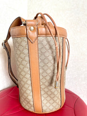 Vintage Celine round box shape hobo bucket shoulder purse in classic brown macadam blaison pattern with leather strap. 050111an1