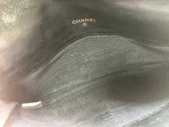 1980s. Vintage CHANEL black goatskin bill, card, checkbook long wallet pouch purse with  mini CC motif.  Classic unisex style.