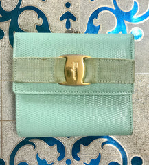 Vintage Salvatore Ferragamo blue lizard embossed leather wallet with gold tone vara motif. 05063012