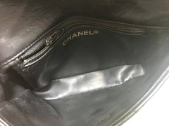 1980s. Vintage CHANEL black lamb leather belt bag, waist bag, fanny pack with golden chain belt & CC closure.  Belt size good for 23.8" through 26.2" (60.5-66.5cm)