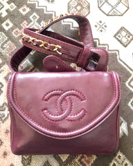 Vintage CHANEL wine fanny pack, leather belt bag with detachable chain belt and CC stitch mark on flap.  Fits 29.5" -32.6" 070502re2