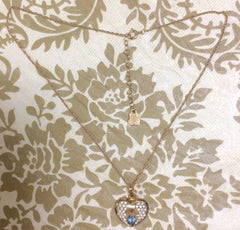 Vintage LANVIN golden skinny chain necklace with heart logo charm pendant top with clear crystals and blue crystal. 080323re1